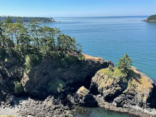 One of the sub-peninsulas of Lighthouse Point, a state park in Washington, on a clear Summer day.